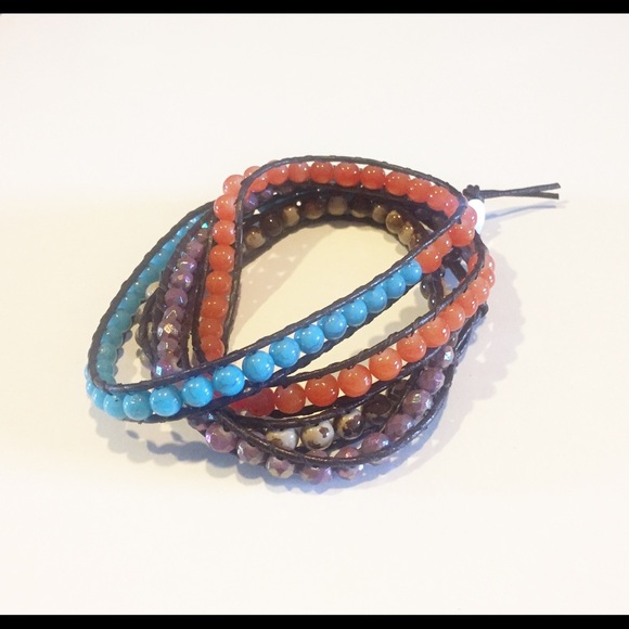 Leather (dark brown) and bead wrapped bracelet. - Picture 1 of 4
